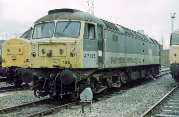 47125 in faded Railfreight Distribution livery at Crewe Diesel Depot.