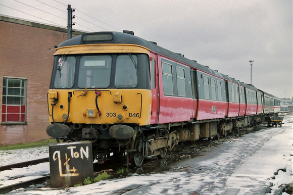 303046 in Strathclyde Passenger Transport livery seen at Springburn Works.