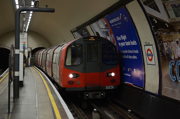51531 emerges into the island platform station of Clapham North on a Morden service.